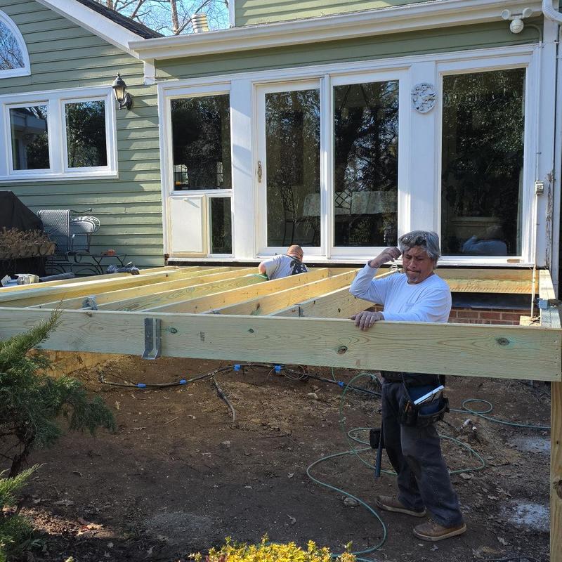 Deck framing with joist hangers installation in Raleigh
