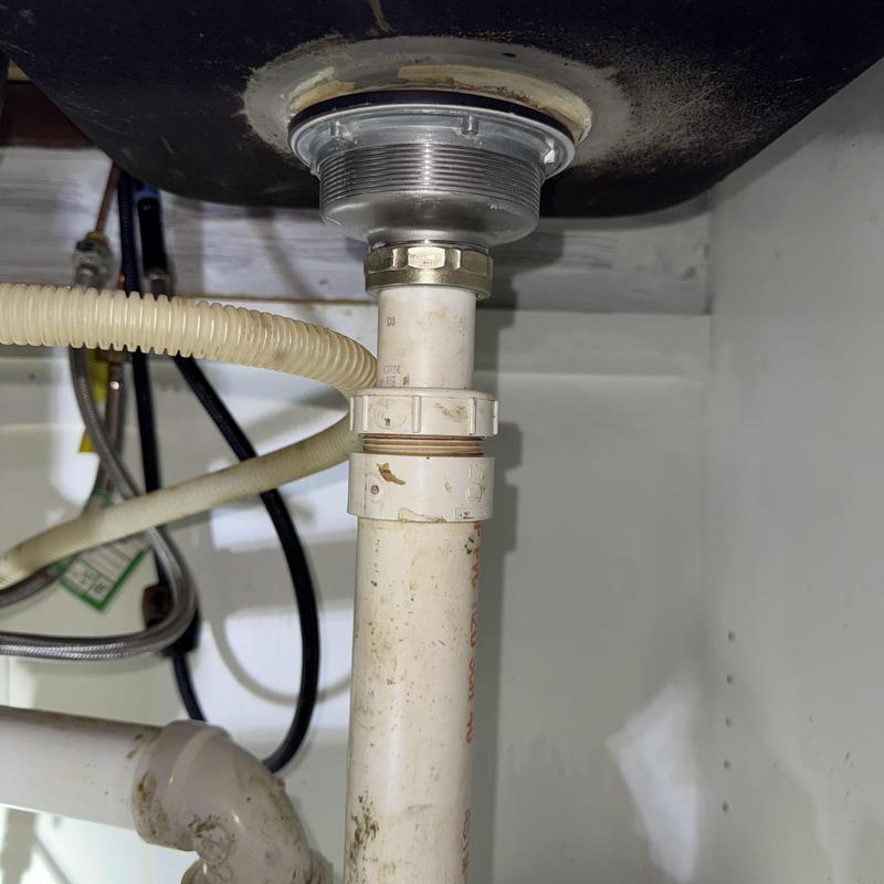 Kitchen sink drain pipe with hose and connections