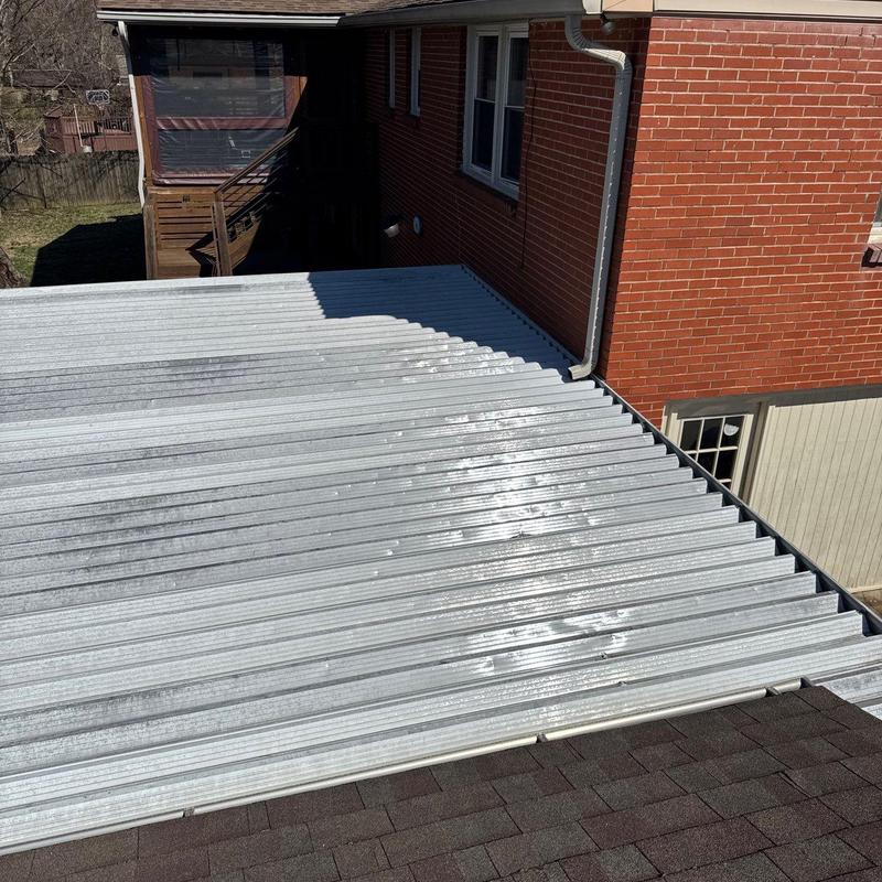 Metal roofing panels with hail damage inspection