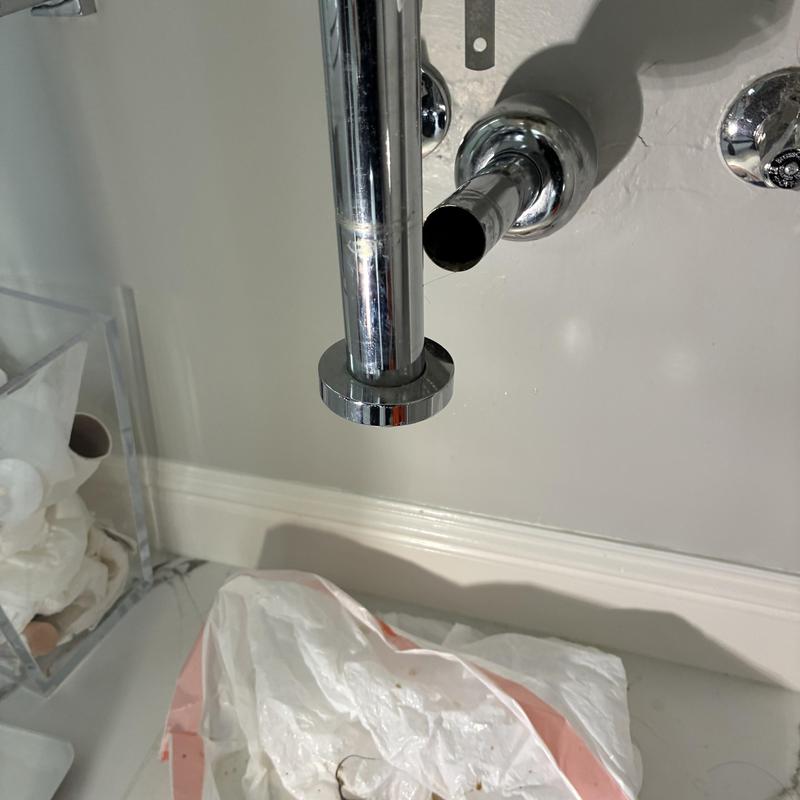 Bathroom sink drain pipes removed for cleaning service