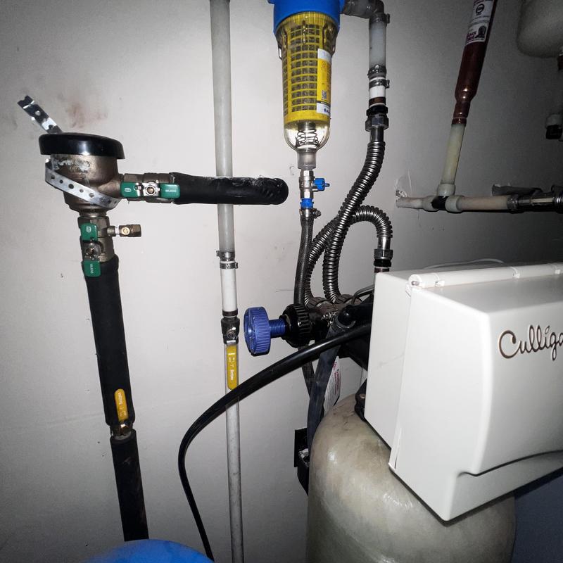 Spin down filtration system with plumbing valves