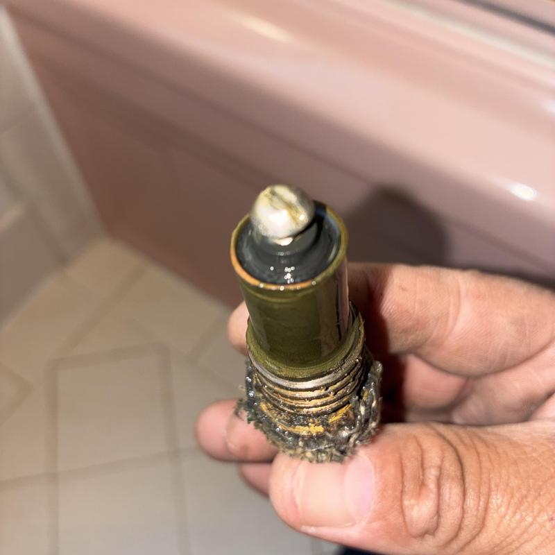 Shower faucet stem with worn washers and corrosion