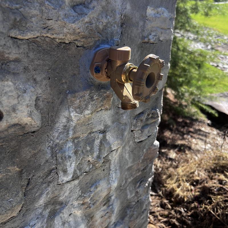 Woodford Frost Proof Sillcock installed on stone wall