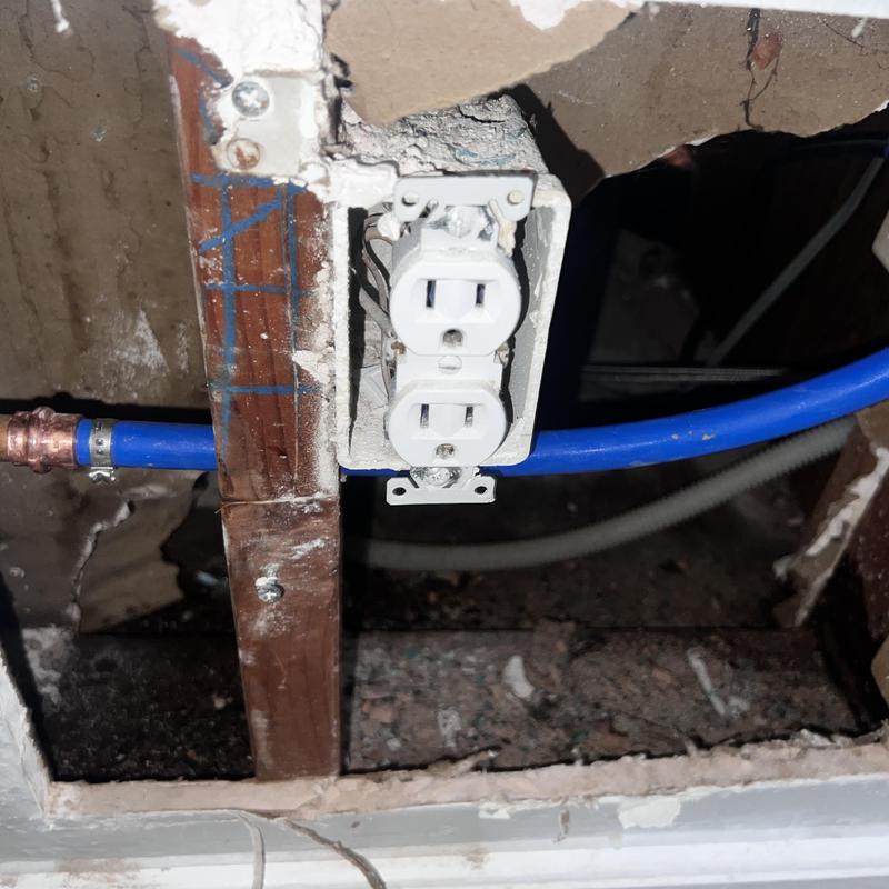 Copper water line with electrical outlet installation