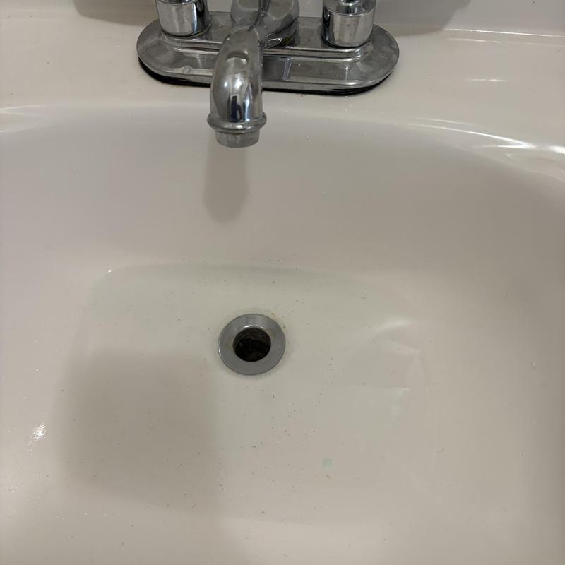 Bathroom sink drain with clear water flow