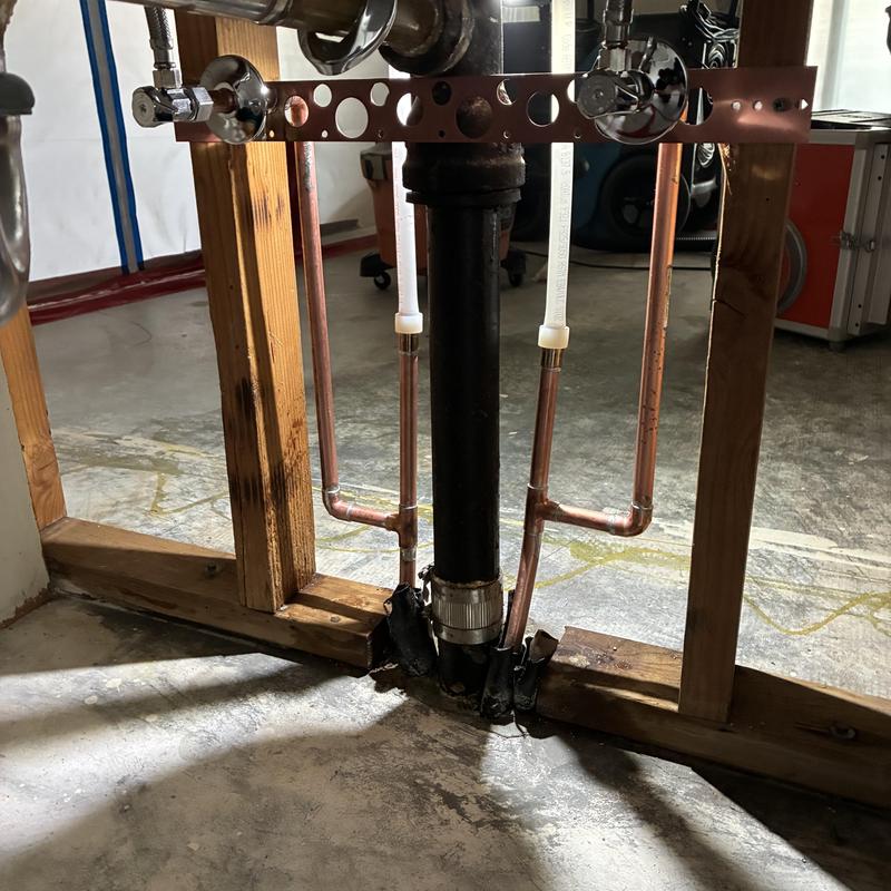 Copper cold water pipes installation under sink framing Copper cold water pipes installation under sink framing