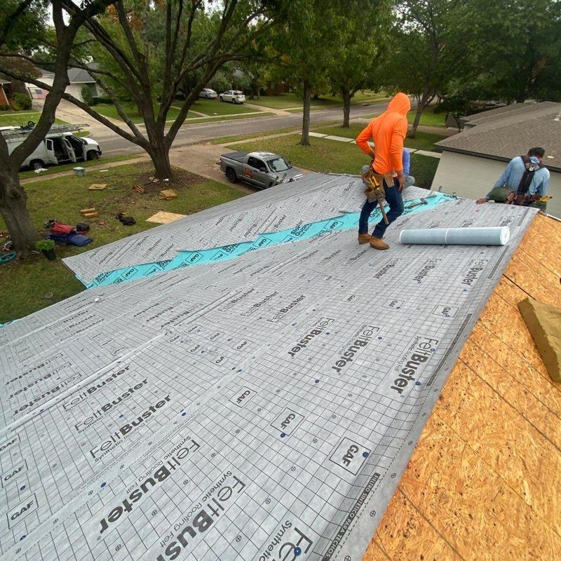 Roof underlayment installation on residential roof Roof underlayment installation on residential roof