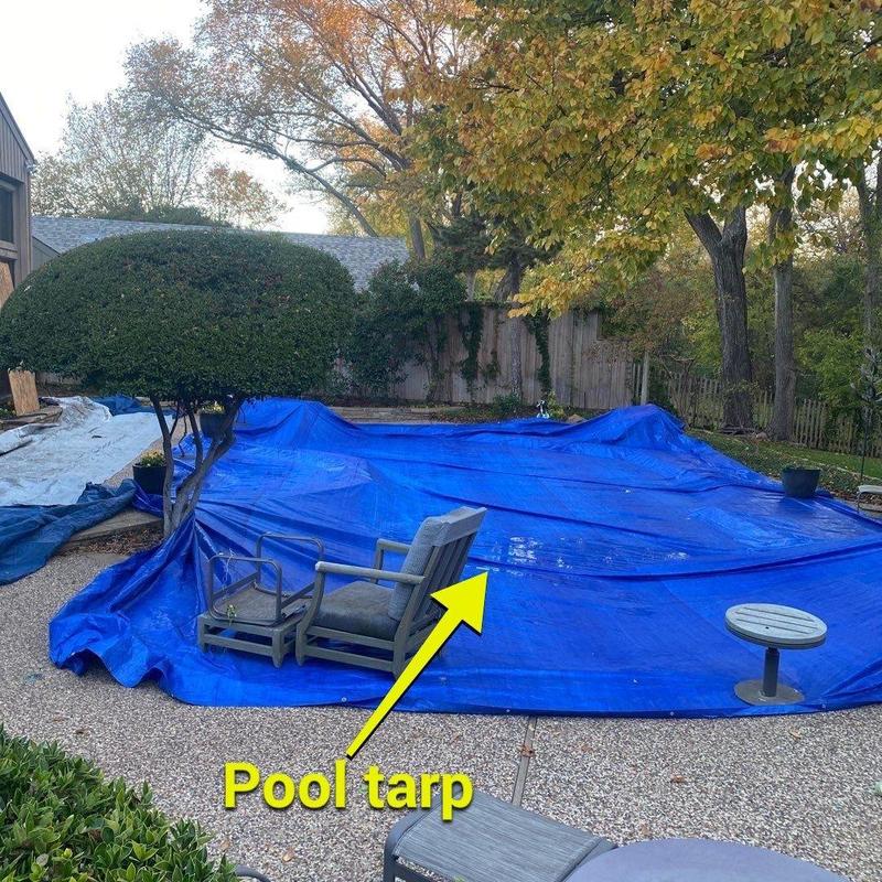 Pool tarp covering outdoor pool during roof replacement Pool tarp covering outdoor pool during roof replacement