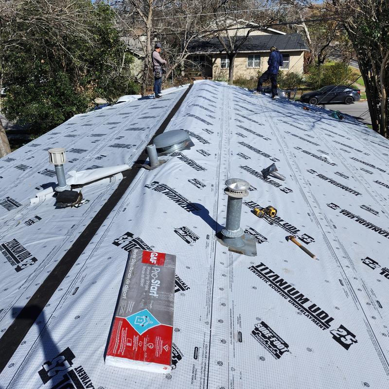 Titanium Wool synthetic roofing underlayment installation on roof Titanium Wool synthetic roofing underlayment installation on roof