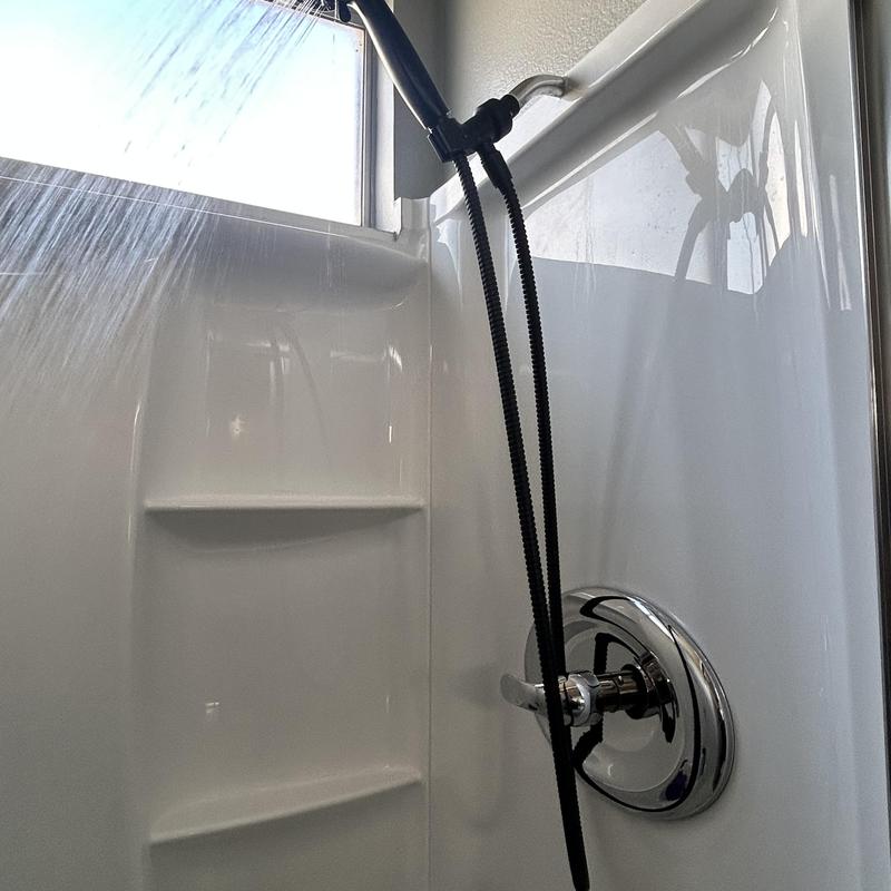 Shower valve and chrome trim with running water