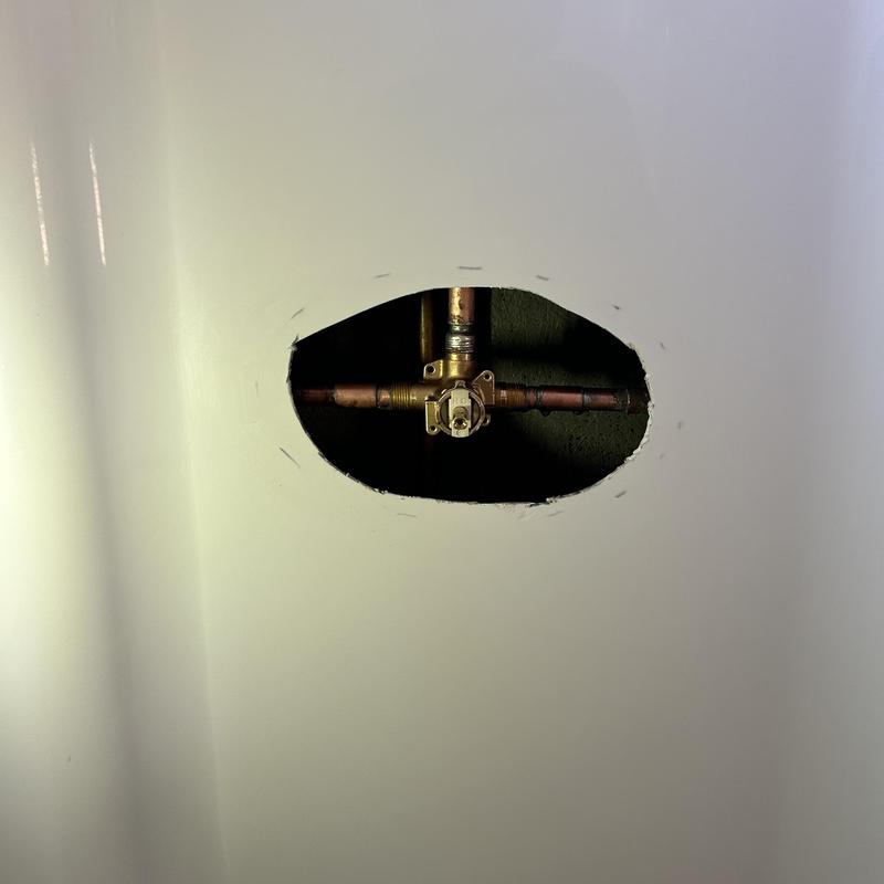 Moen shower valve and copper piping access hole