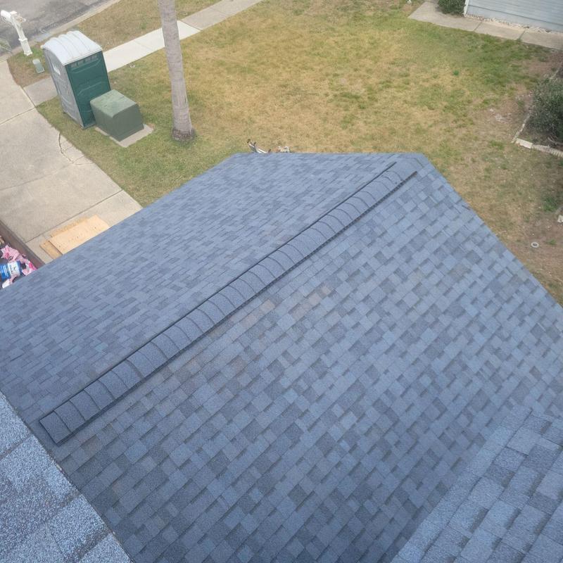 Owens Corning shingle roof with ridge vent installed