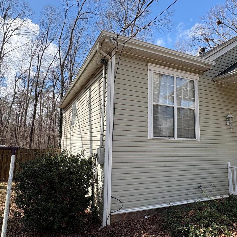 Gutter system and fascia replacement on house exterior