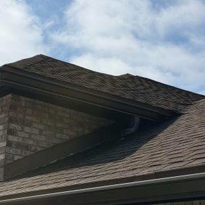 6 K style gutter installation on residential roof edge
