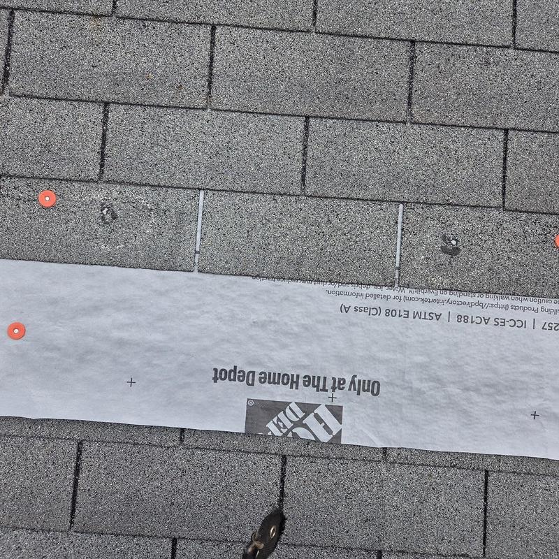 Roofing shingles and underlayment replacement with pipe boot