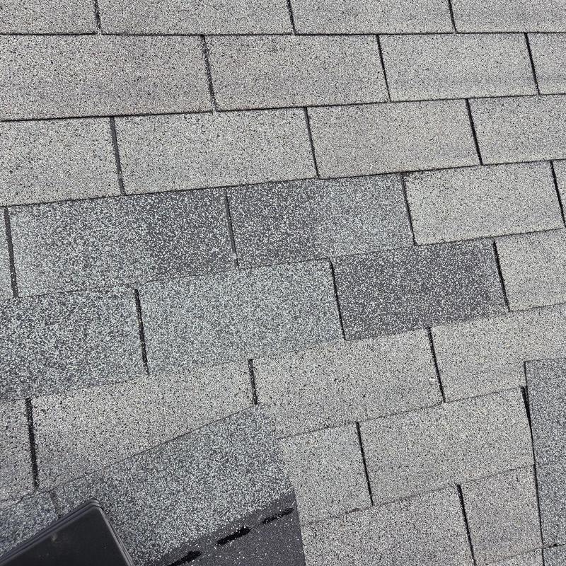 Roof shingles replacement with pipe boot and caulking