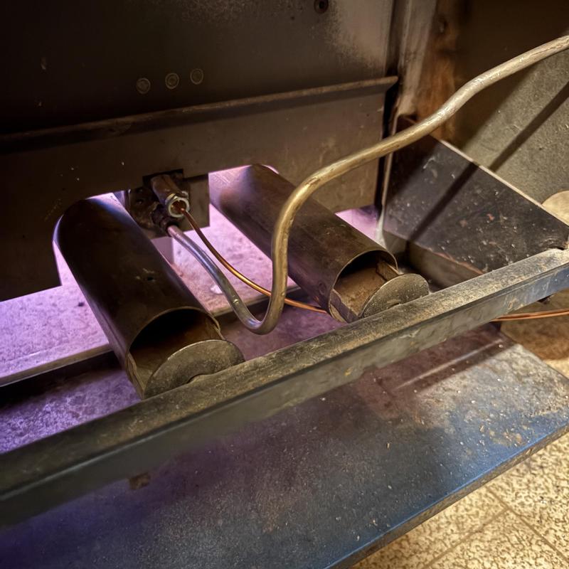 Boiler pilot assembly with thermocouple and pilot nozzle cleaning