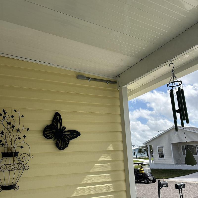Vinyl siding with custom pergola and porch decor