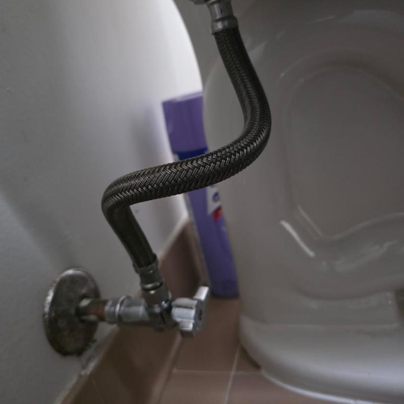 Toilet angle stop valve and braided supply line installation