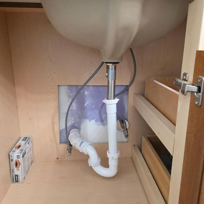 Vanity sink drain and water supply lines installation