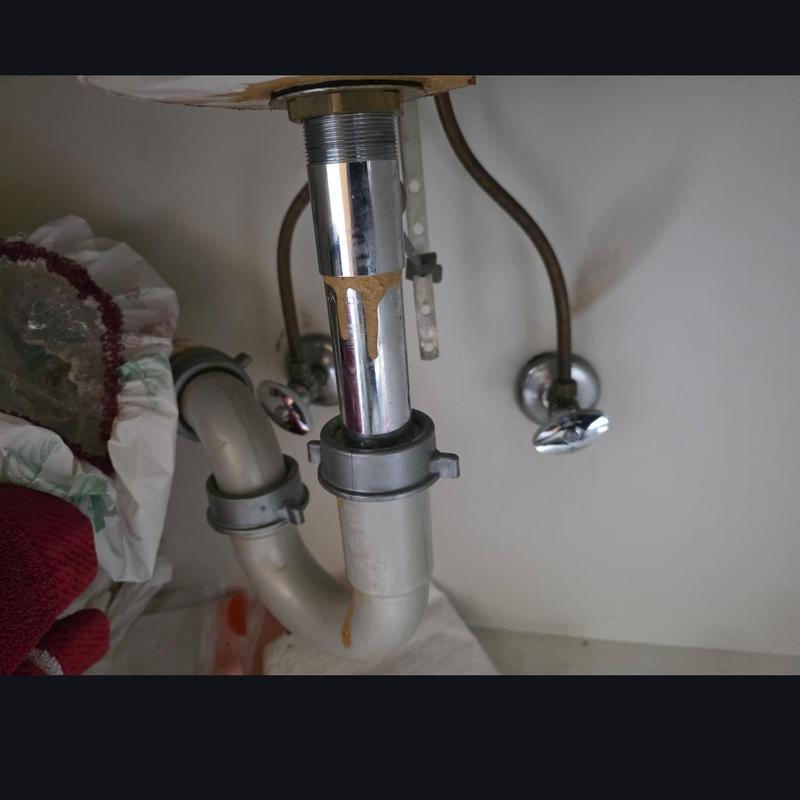 Vanity sink drain pipes with supply valves installed