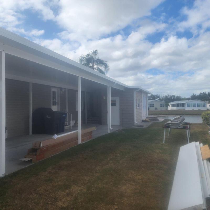 Lanai and attached carport exterior with construction materials
