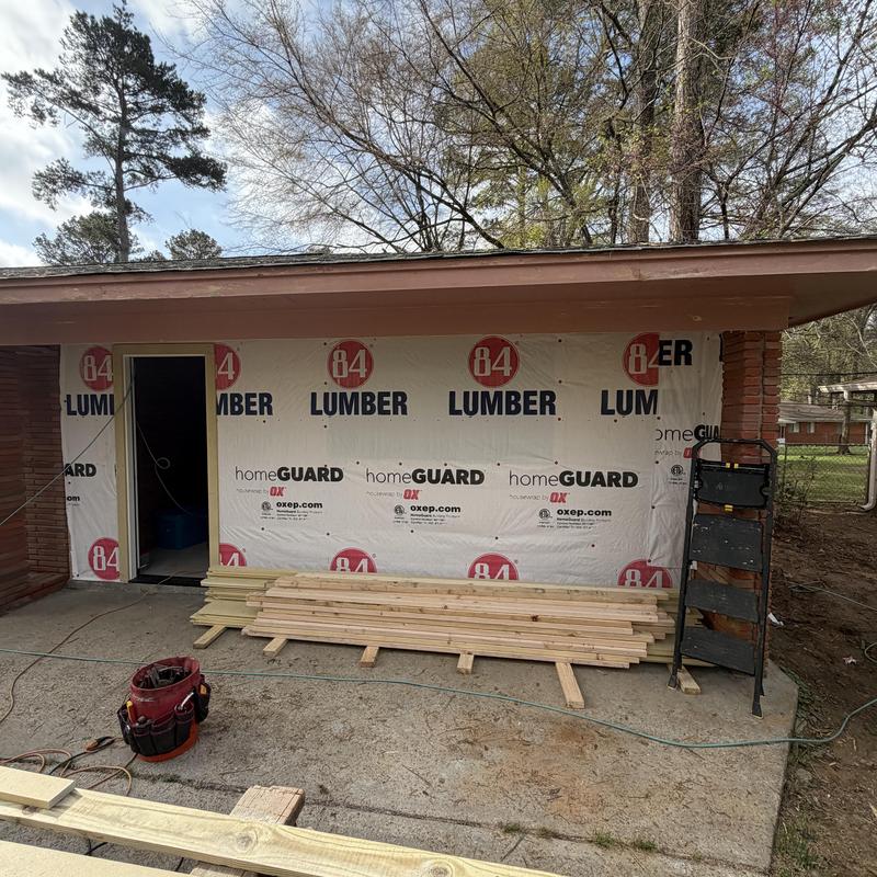 Hardy lap siding installation with lumber and wrap