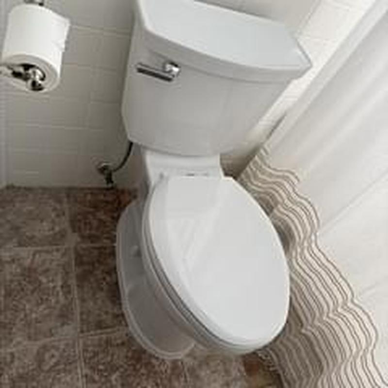 American Standard 2-piece toilet installed in bathroom