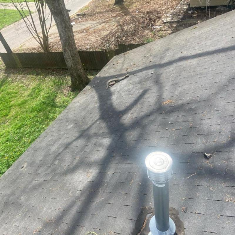 3 tab shingle roof with damaged shingles and vent pipe