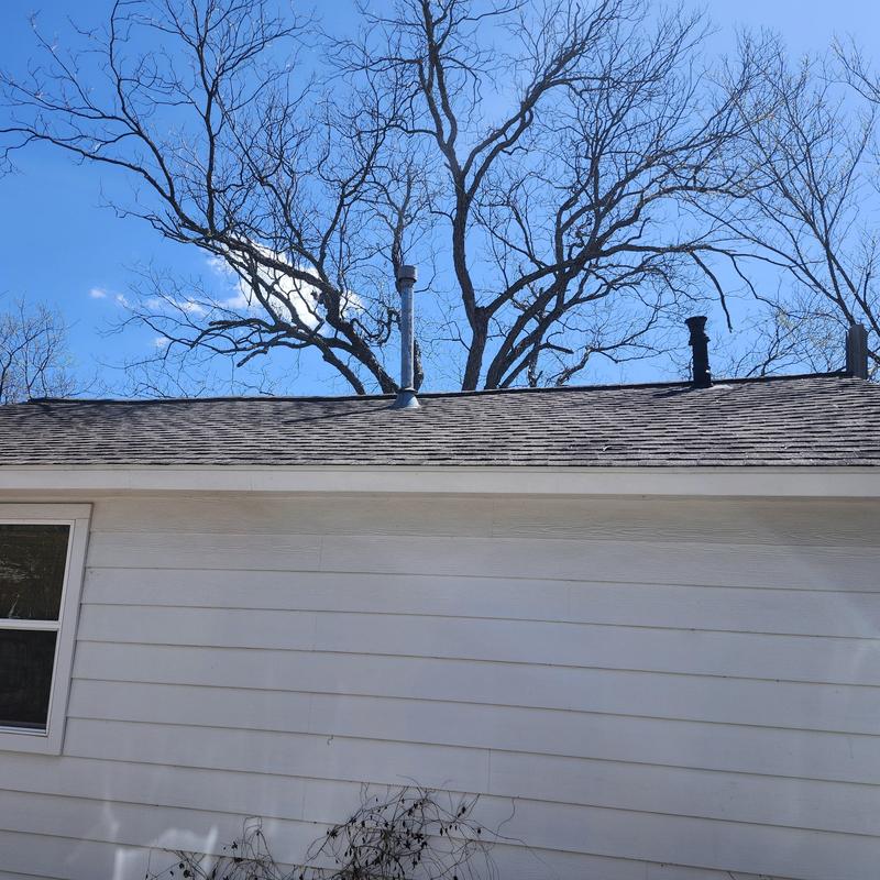 30-year shingles with hail damage on residential roof 30-year shingles with hail damage on residential roof