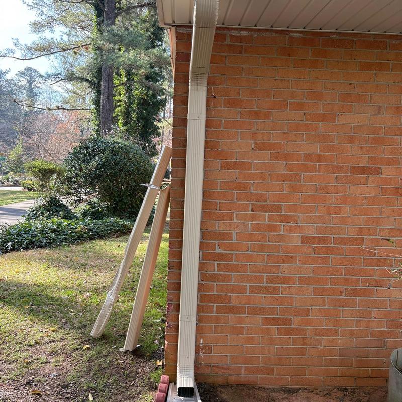 Downspout replacement on brick house exterior, Loganville GA