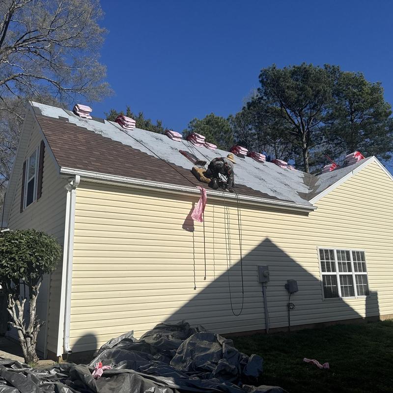 Owens Corning Brownwood shingle roof installation in progress