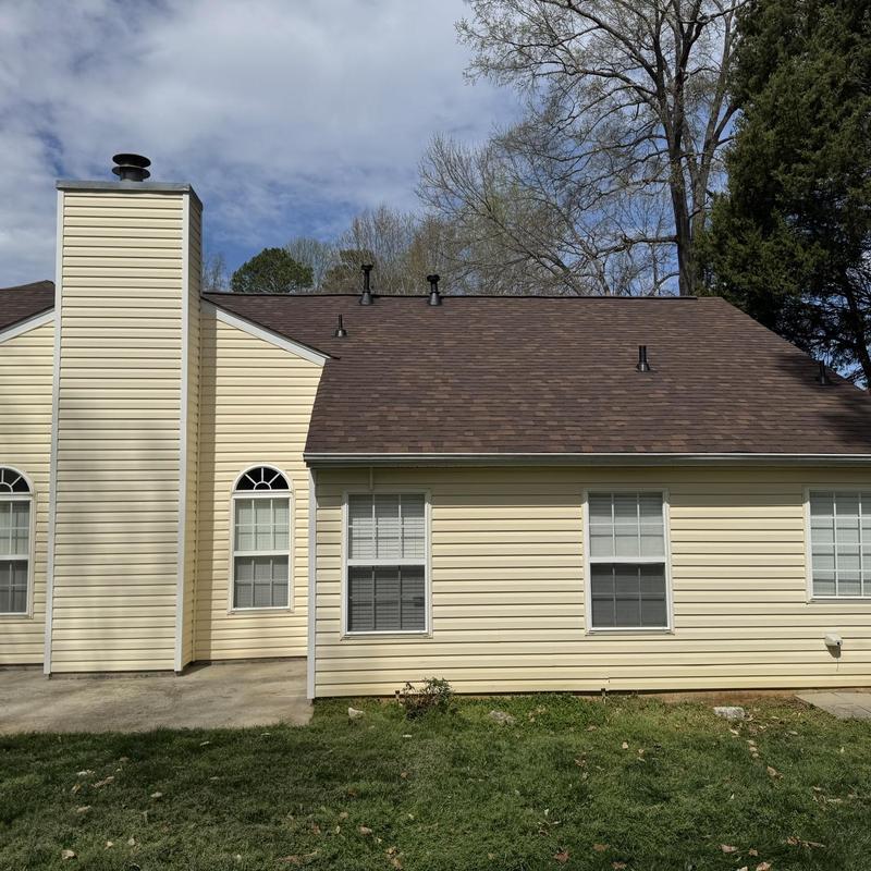 Owens Corning Brownwood shingle roof on house exterior