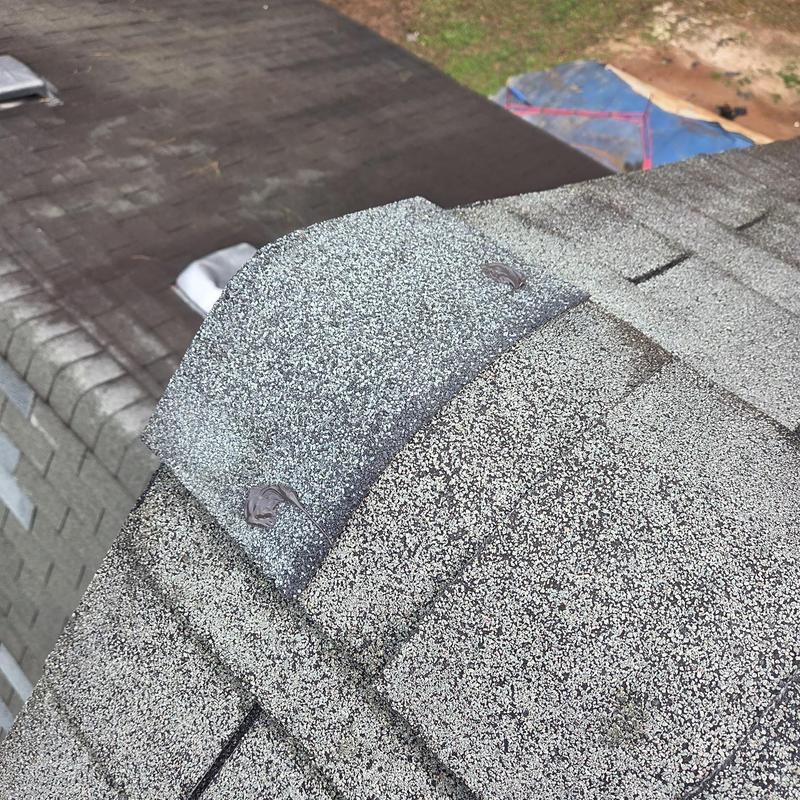 Pipe boot replacement on shingled roof with caulked seals