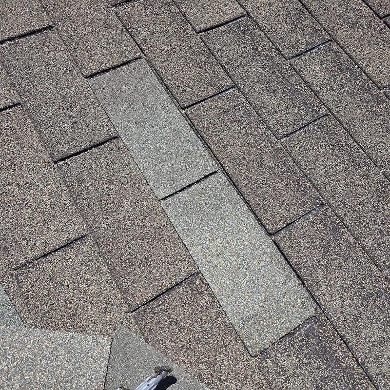 Roof shingles replacement on residential roof