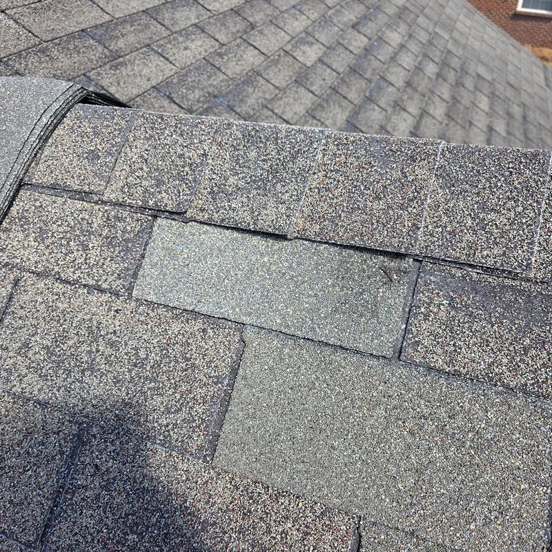 Asphalt shingles with new replacement and caulking