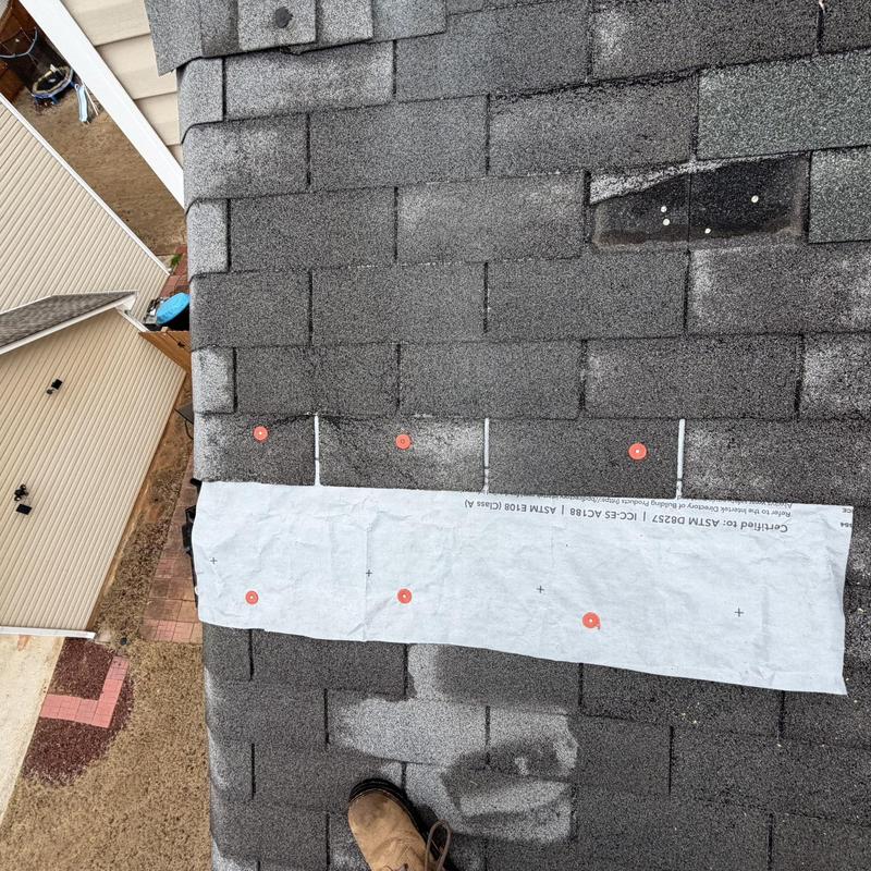 Asphalt shingles with new underlayment installation