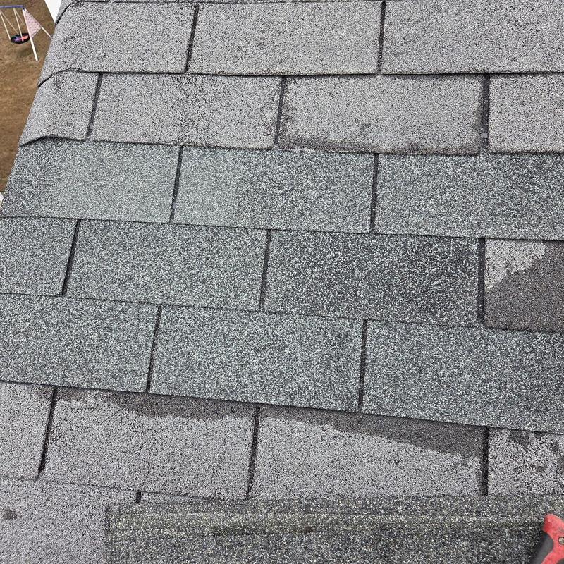 Damaged roof shingles replaced on residential roof