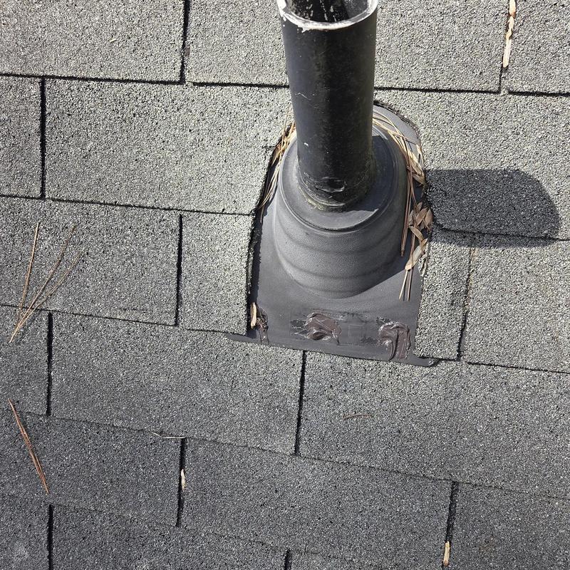 5.5-inch vent pipe rain cap with caulk on shingles