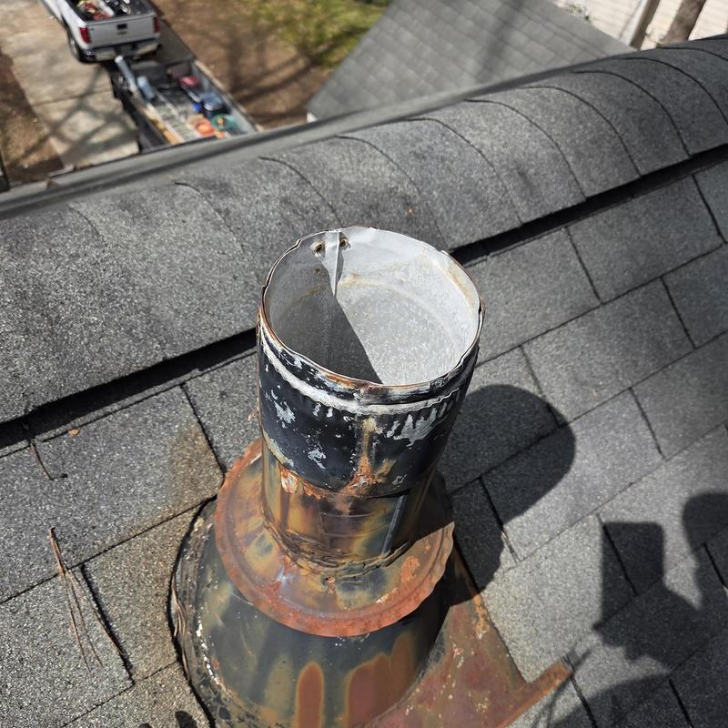 5.5-inch rain cap on rusted vent pipe on roof
