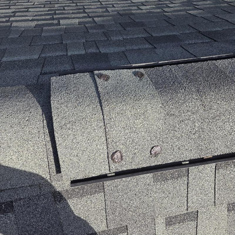 Roof shingle repairs with sealed nails on asphalt shingles