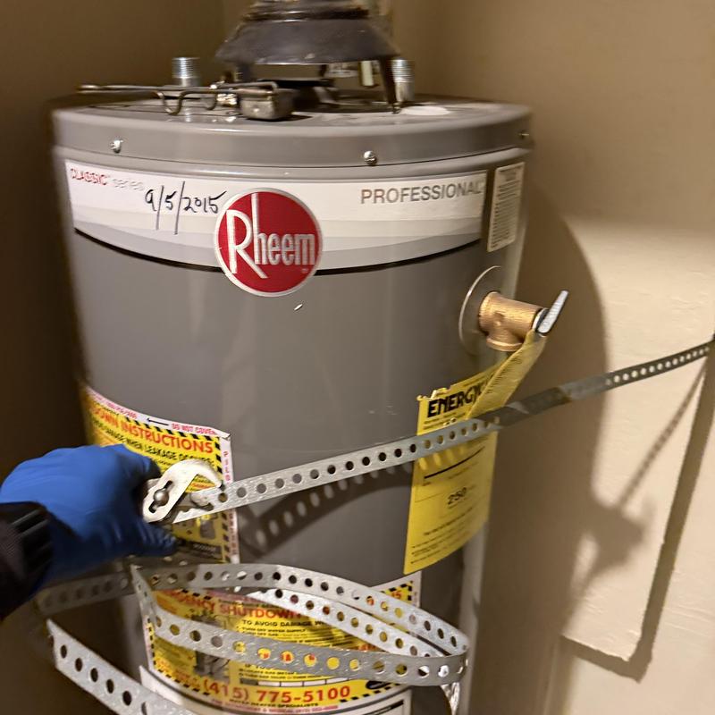 Water heater installation with new gas line in residence