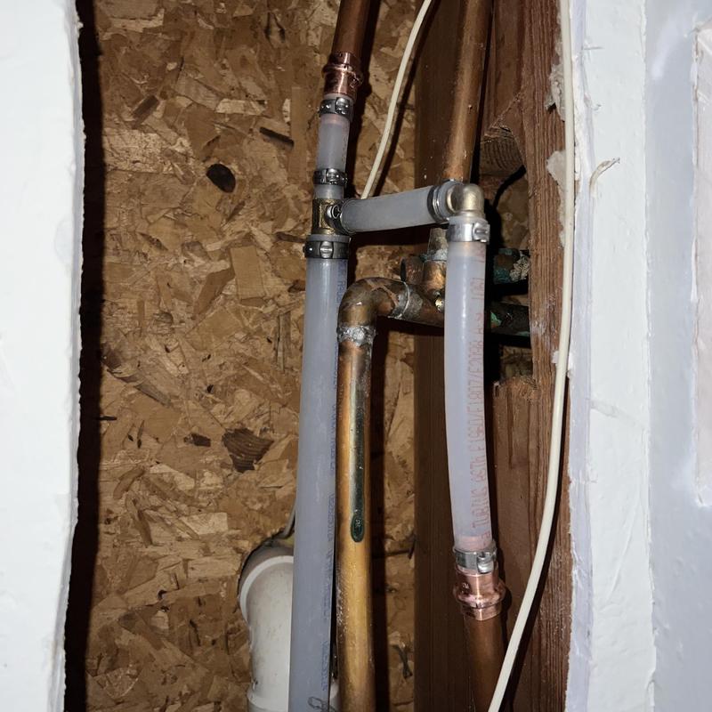Water line reroute with copper and PEX tubing