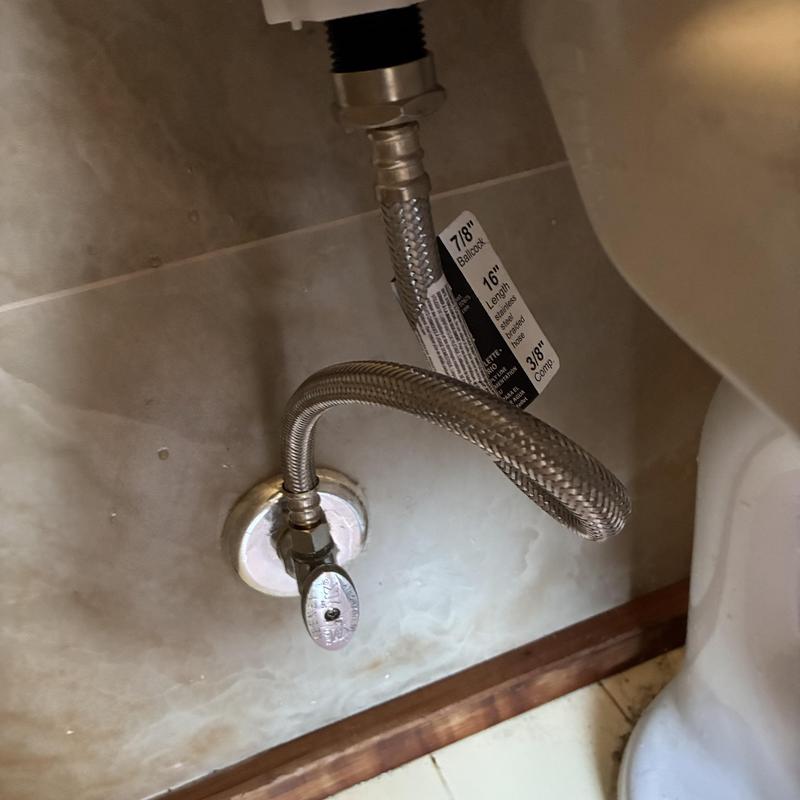 Toilet water supply line and angle stop installation
