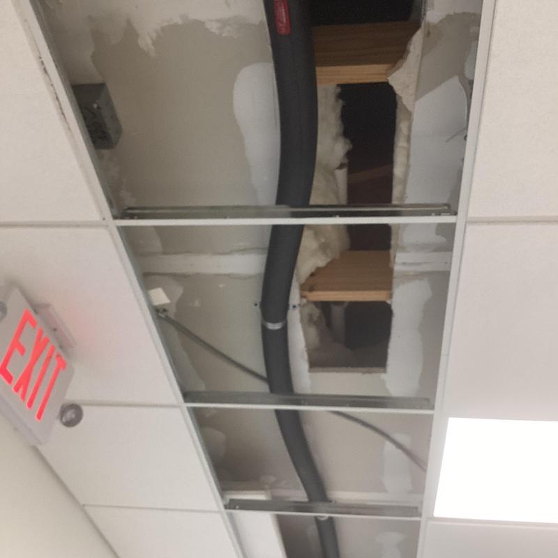 Insulated water supply pipe in drop ceiling cavity