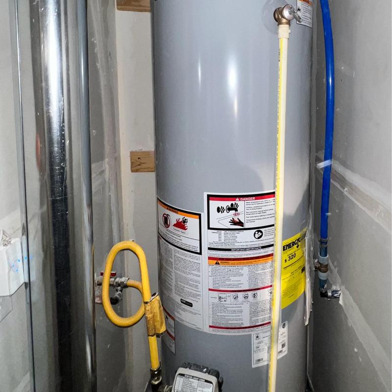 AO Smith natural gas water heater with piping