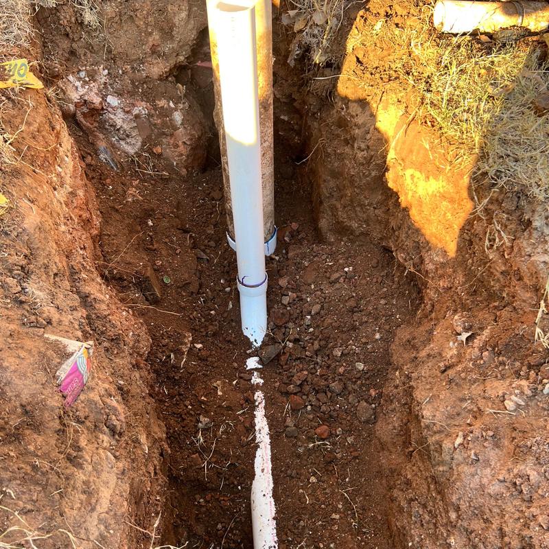 Sewer service line replacement in trench excavation