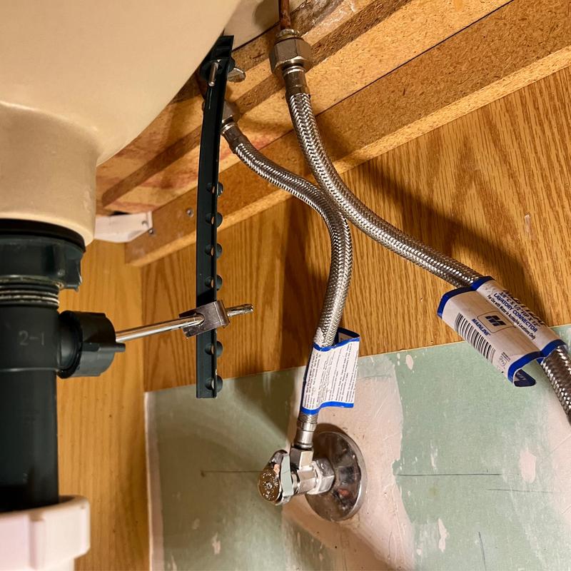 14-turn shut off valve and supply lines under lavatory