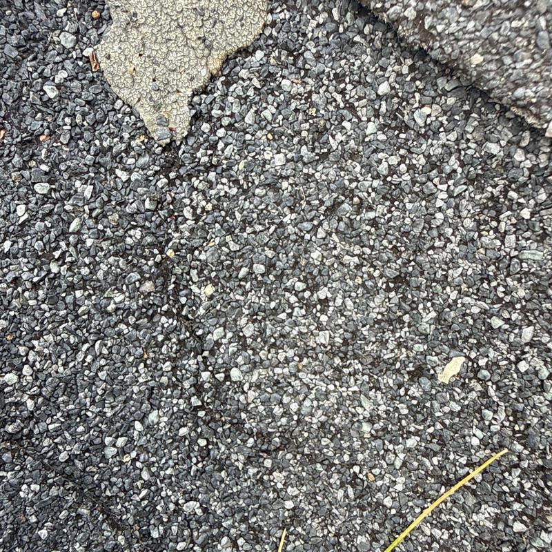 3-tab shingle roof with damaged and missing granules