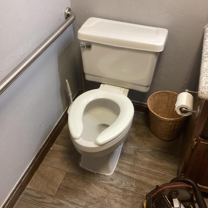 Toilet flange and reset installation in bathroom